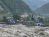 Lhende River flood damages customs yard in Rasuwa