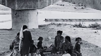 families living under bridge