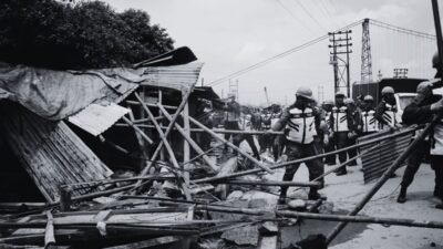 Bulldozing poor families in rainy season