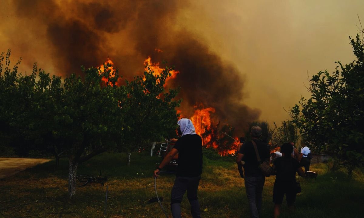 Europe wildfires kill three, force mass evacuations